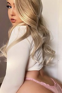 chubby woman in pantyhose posing seductively for the camera