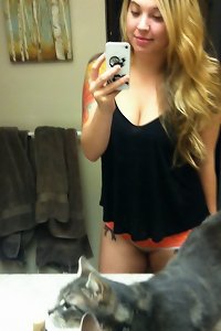 voluptuous lush nymph invitingly posing in underwear